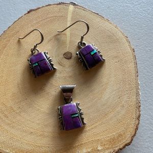 Sterling earrings and pendant.